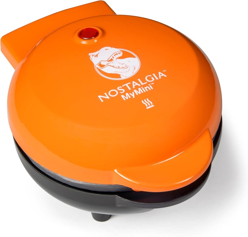 Nostalgia MyMini Dinosaurs Shape Electric Waffle Maker, 5-Inch Non-Stick Griddle for Waffles, Hash Browns, Eggs, and More, Orange - Image 1